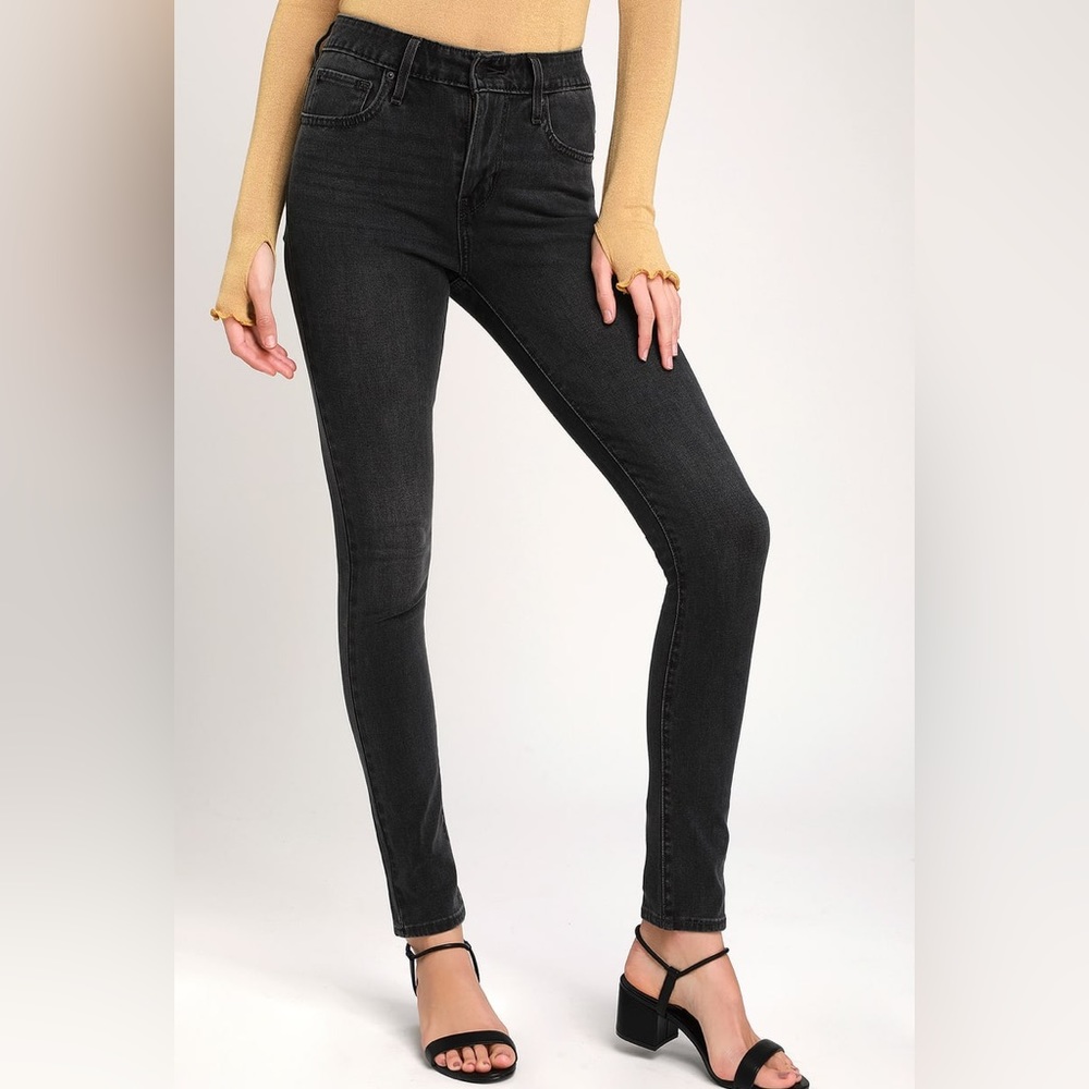 Levi’s 721 High Rise Skinny Washed Faded Black Denim